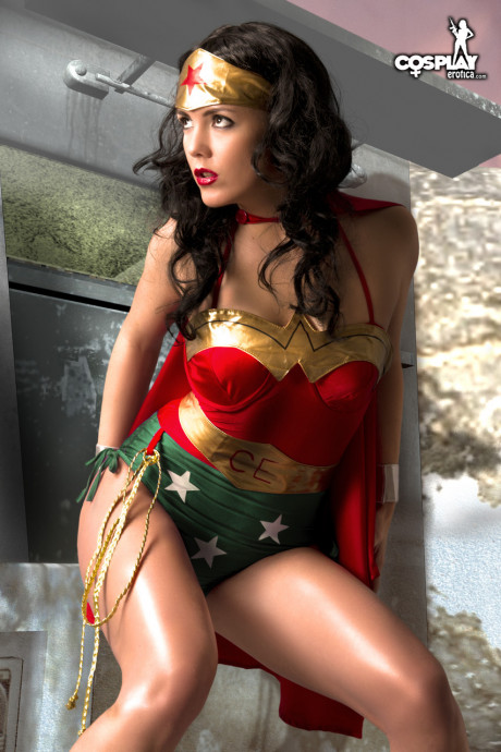 Gorgeous brunette peels off her Wonder girl outfit in a tempting manner - #1140172