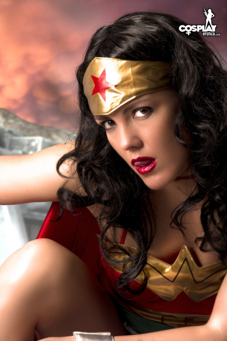 Gorgeous brunette peels off her Wonder girl outfit in a tempting manner - #1140175