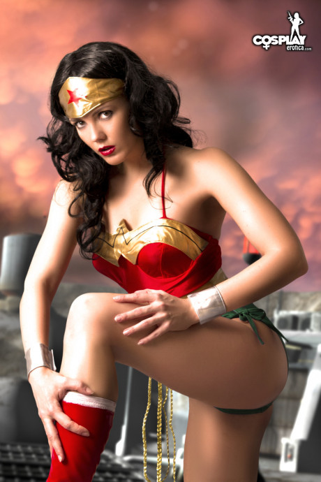 Gorgeous brunette peels off her Wonder girl outfit in a tempting manner - #1140177