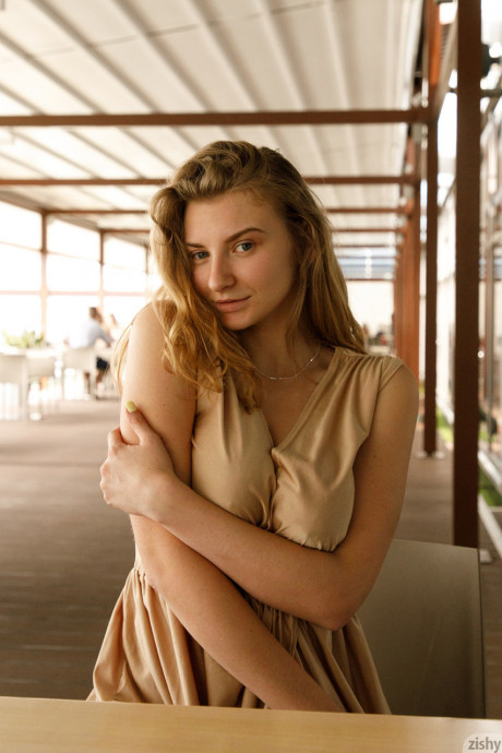 Ukrainian babe Regan Budimir flashes her humongous tit while posing at the mall - #528803