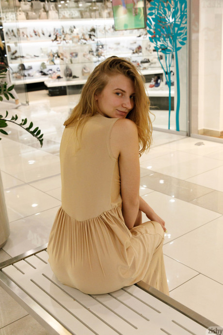 Ukrainian babe Regan Budimir flashes her humongous tit while posing at the mall - #528805