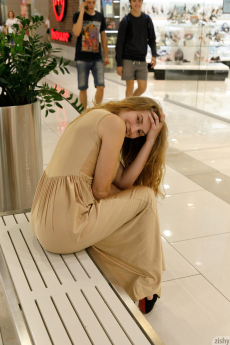 Ukrainian babe Regan Budimir flashes her humongous tit while posing at the mall - #528806
