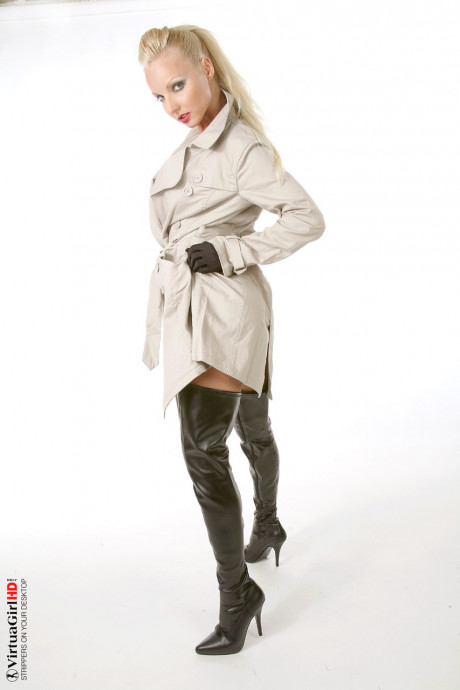 Platinum blonde lady broad Vicky S doffs an overcoat in a bondage harness and boots - #1125607
