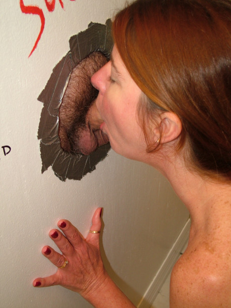 Sleazy redhead wife Dee swallowing a dong at the gloryhole and receiving a facial - #668197