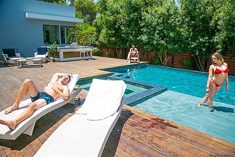 Hot yellow-haired Kagney Linn Karter having anal sex with two thumping penii poolside