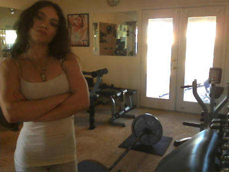 Sweet babe with amazing abs Tia flaunts her biceps at a home gym - #428240
