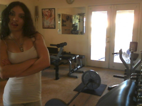 Sweet babe with amazing abs Tia flaunts her biceps at a home gym - #428241
