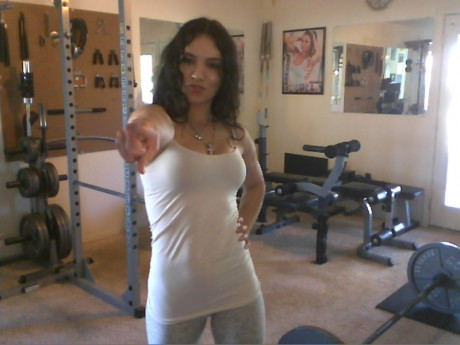 Sweet babe with amazing abs Tia flaunts her biceps at a home gym - #428243