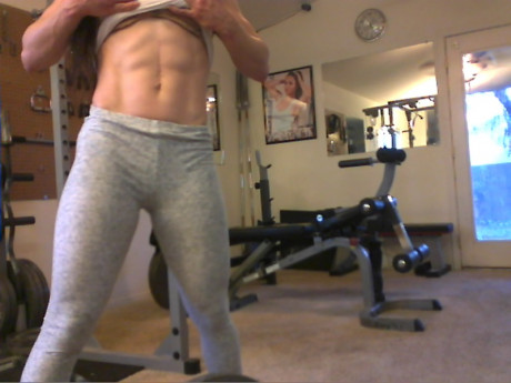 Sweet babe with amazing abs Tia flaunts her biceps at a home gym - #428250