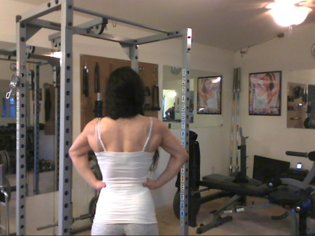 Sweet babe with amazing abs Tia flaunts her biceps at a home gym - #428254