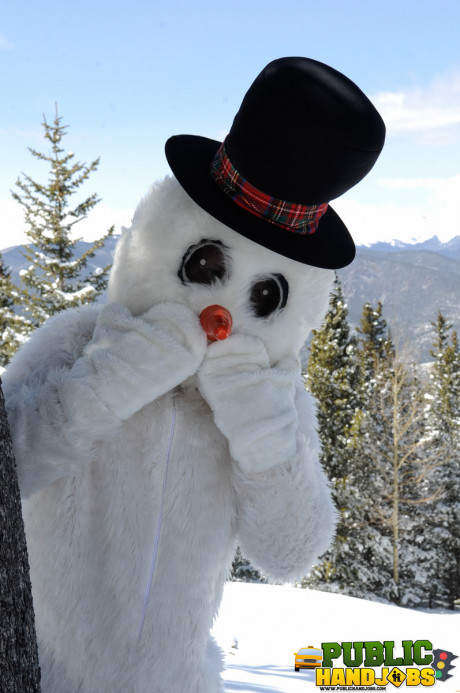 Dirty redhead Brandi de Lafey gives a snowman a CFNM handjob in the woods - #663432
