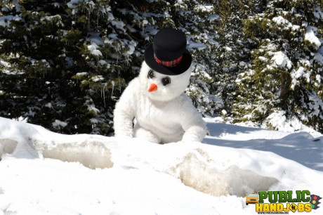 Dirty redhead Brandi de Lafey gives a snowman a CFNM handjob in the woods - #663434