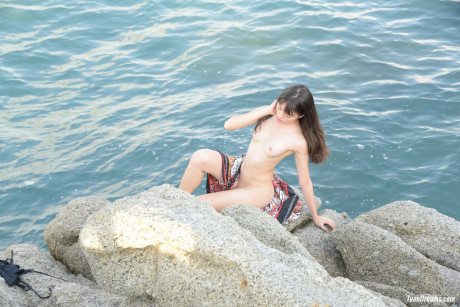 Shameless amateur young Sowan flaunts her oriental pussy on a public beach - #486440