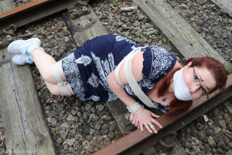 Fully clothed ginger is left gagged and bound on railway tracks - #318947