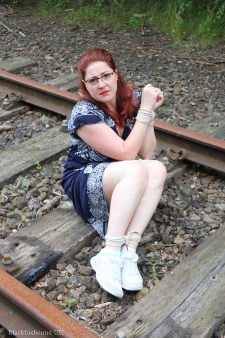 Fully clothed ginger is left gagged and bound on railway tracks - #318950