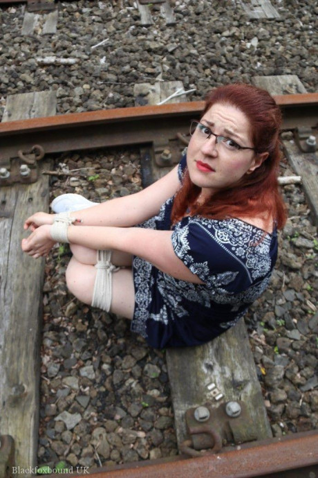 Fully clothed ginger is left gagged and bound on railway tracks - #318951