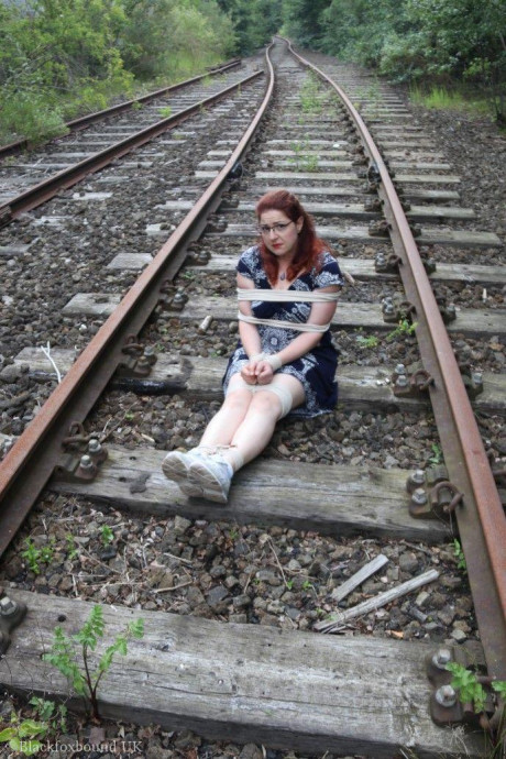 Fully clothed ginger is left gagged and bound on railway tracks - #318952