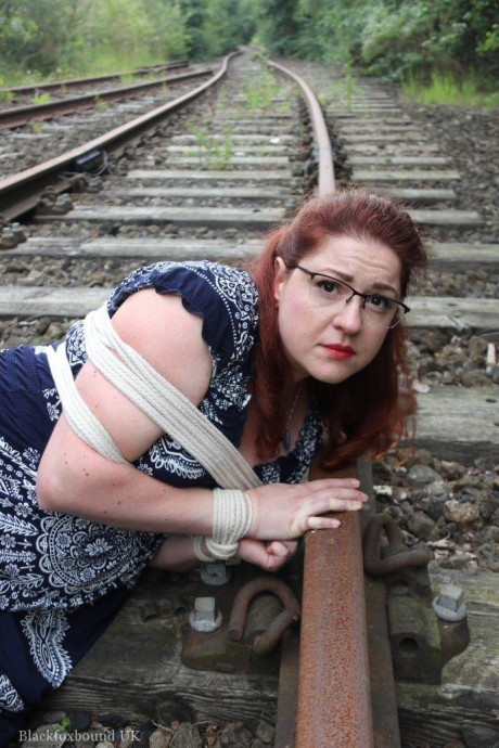 Fully clothed ginger is left gagged and bound on railway tracks - #318954