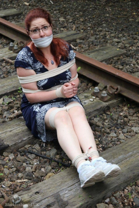 Fully clothed ginger is left gagged and bound on railway tracks - #318956