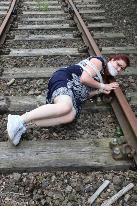 Fully clothed ginger is left gagged and bound on railway tracks - #318957