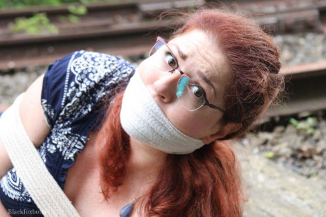 Fully clothed ginger is left gagged and bound on railway tracks - #318962