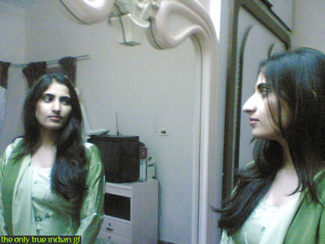 Indian girl gf woman takes selfies in a mirror while wearing a see-through tank top - #488430