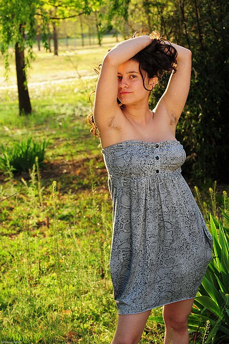 Curvy amateur young Mia unveils her large boobs and rubs her bush in nature - Image 1 of 20  in Outdoor category   featuring Mia 