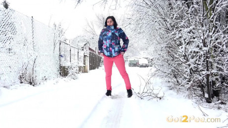 Stunning European babe squats to pee in the snow