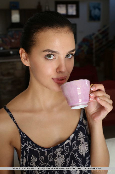 Exotic young Venice Lei is ready for undressed posing after her morning coffee