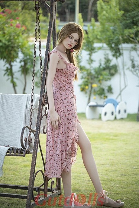 Pretty sex doll gets nude on a patio next to a table of flowers - Image 3 of 16  in Sex Doll category  