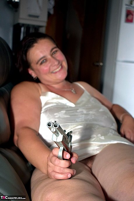 Mature BBW Cheeky Dee holds a bouquet of flowers before getting nude - Image 7 of 16  in Nipples category   featuring Cheeky Dee 