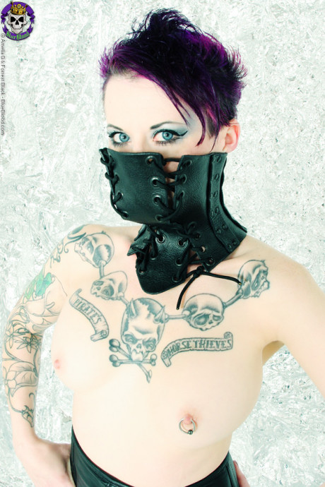 Goth model Nixon Sixx poses in leather neck corset and matching skirt - #859209