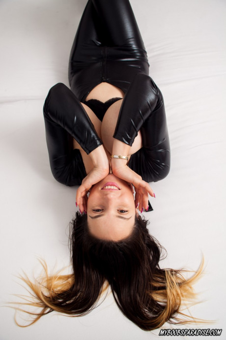 Solo model releases her great titties from latex cat suit in stiletto heels - #210244