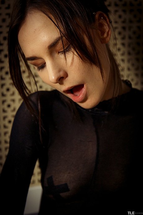 Glamorous brunette Poppy masturbates in her pretty bodystocking in the washroom - Image 18 of 20  in Model category   featuring Poppy 