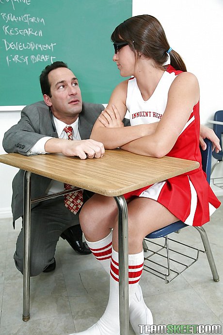 Tremendous brunette cheerleader Bailey Lane blowing hard cock - Image 1 of 16  in Teen category   featuring Dino Bravo, Bailey Lane 