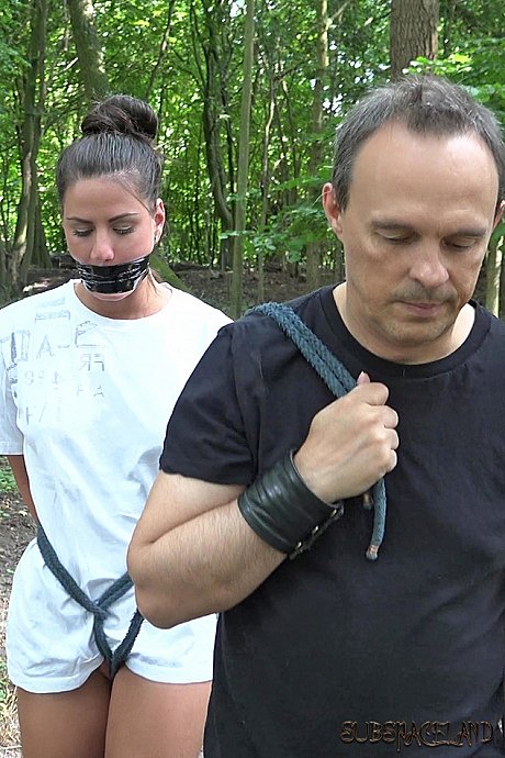 Fresh teenie brunette slave is disciplined and plowed in the forest by her Master - Image 1 of 16  in Outdoor category   featuring Athina 