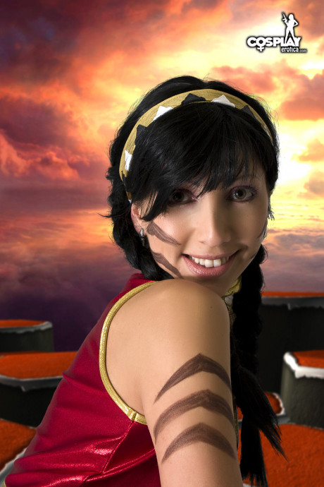 Brunette cosplayer takes off her outfit while sporting braided pigtails