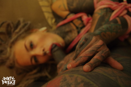 Heavily tattooed female licks a black dick and masturbates while tied up - #1078335