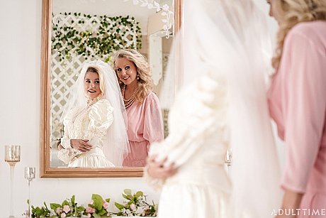 Carolina Sweets is affixed with a garter before a lesbian wedding to Julia Ann - Image 15 of 15  in Lesbian category   featuring Carolina Sweets, Julia Ann 