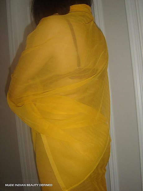 Chubby Indian female frees her shaved vagina and booty from a wrap - Image 2 of 10  in Close Up category  