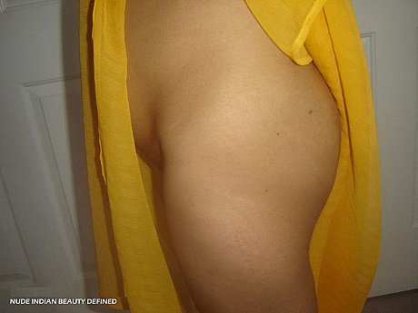 Chubby Indian female frees her shaved vagina and booty from a wrap - Image 7 of 10  in Close Up category  