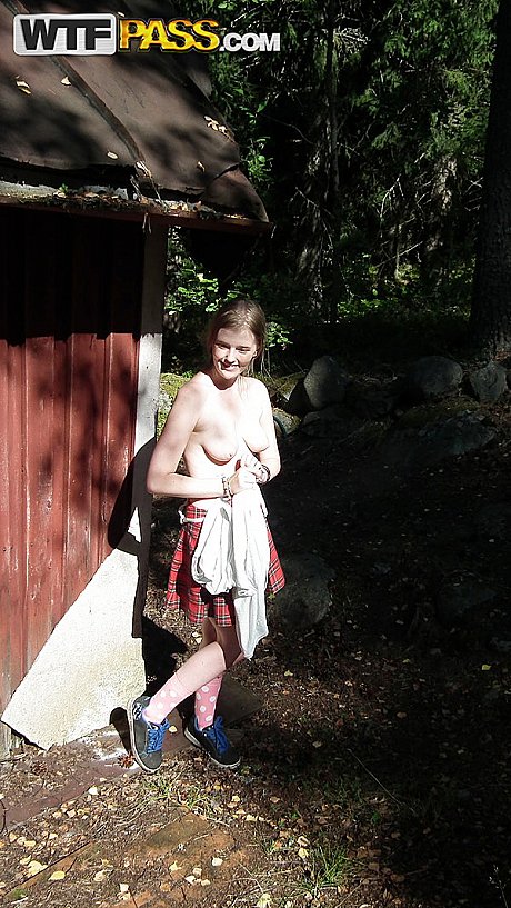 Solo whore GF woman shows her tits and vagina while forcing entry into abandoned cabin