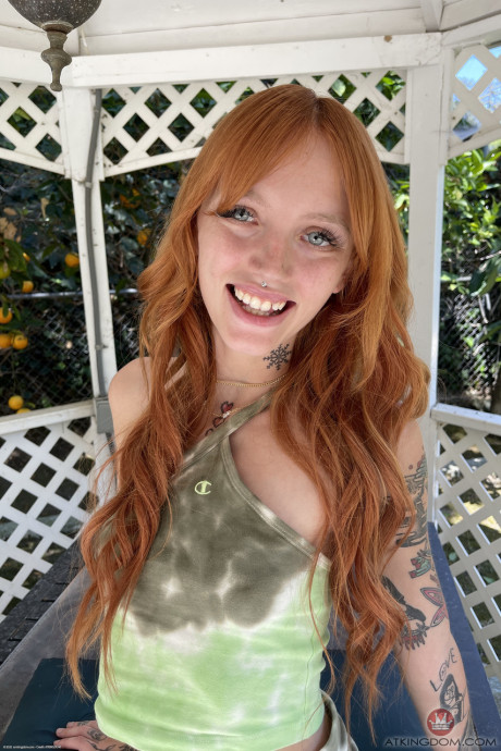 Cute redheaded babe Kate Bloom flaunts her feet and shaved holes outdoors - #1319274