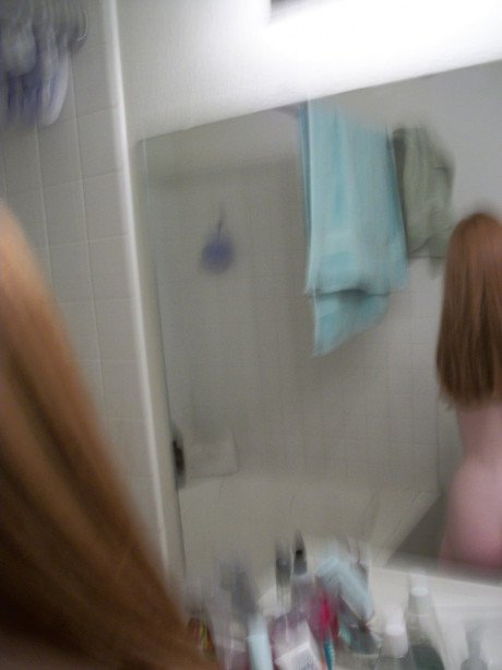 Redhead amateur Emily takes selfies of her naked teenie body in the mirror - #1223616