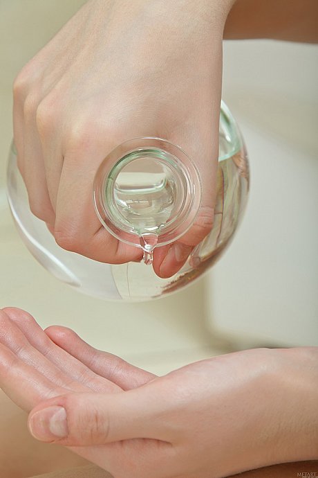 Teenie babe Sabina B oils up her puffy nipples & her fine body in the bathroom - Image 14 of 21  in Model category   featuring Sabina B 