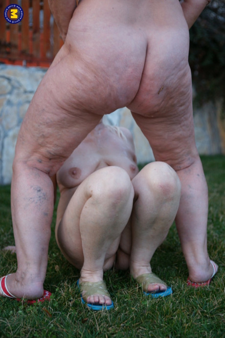 Mature grannies get slutty with younger hunks and piss on each other outdoors - #1480763