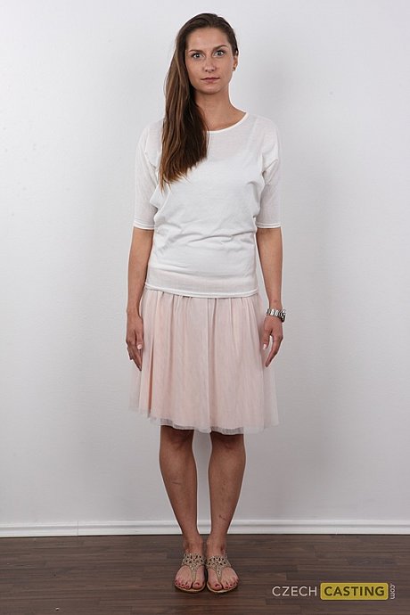 Caucasian amateur takes off her clothes while standing in front of a wall - Image 2 of 12  in Close Up category   featuring Karolina 