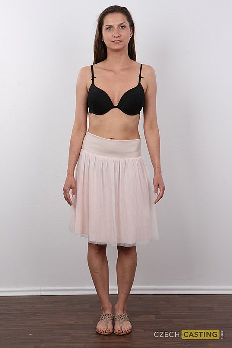 Caucasian amateur takes off her clothes while standing in front of a wall - Image 3 of 12  in Close Up category   featuring Karolina 