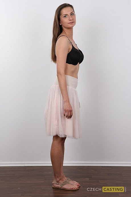 Caucasian amateur takes off her clothes while standing in front of a wall - Image 4 of 12  in Close Up category   featuring Karolina 