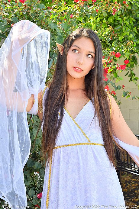 Brunette amateur Melody fucks a dildo atop garden statuary - Image 2 of 15  in Dildo category   featuring Melody Wylde 